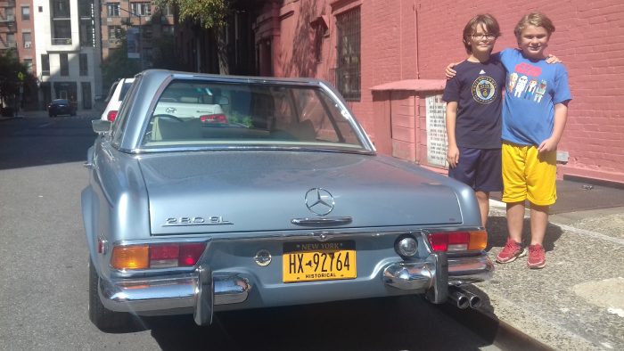 Dylan and Alex with a 1966 Mercedes 280SL
