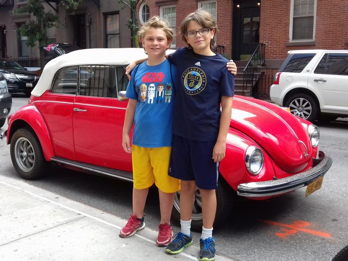 Alex and Dylan with a 1971 Volkswagon Beetle convertible