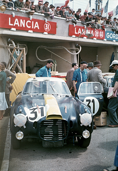 Le Mans before the start of the 24 Hours on June 13, 1953. This Lancia berlinetta was a D20 with ...